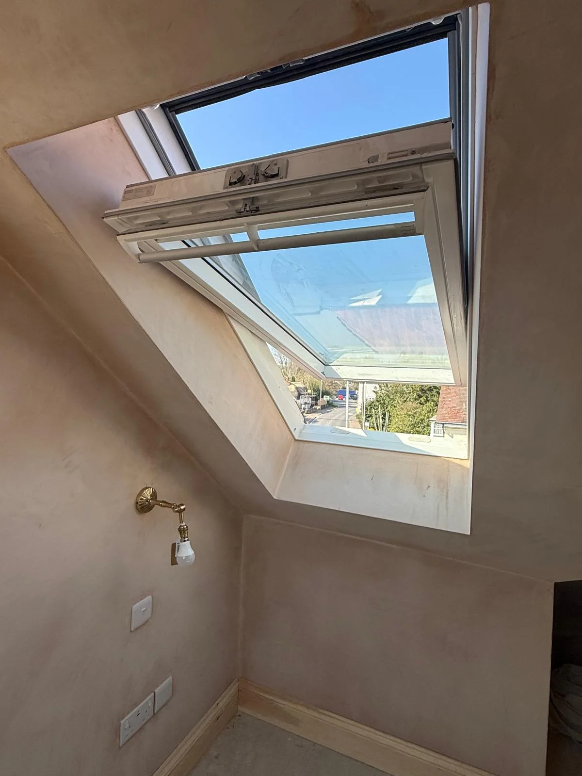 Loft bathroom roof window
